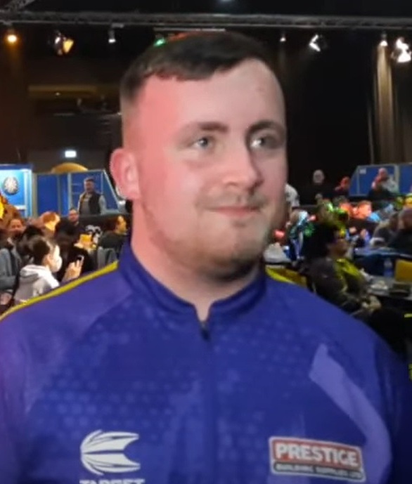 Luke Littler at the WDF World Masters on December 11, 2022. uploaded to Youtube by Darts Actueel under CC-BY-3.0 Unported Licence.
