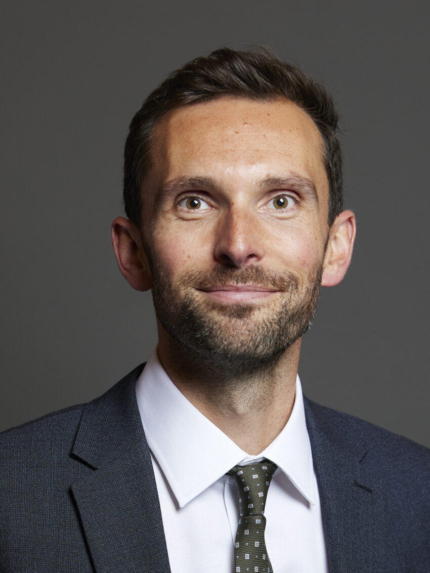 Official portrait of Josh MacAlister MP, 3:4 crop.