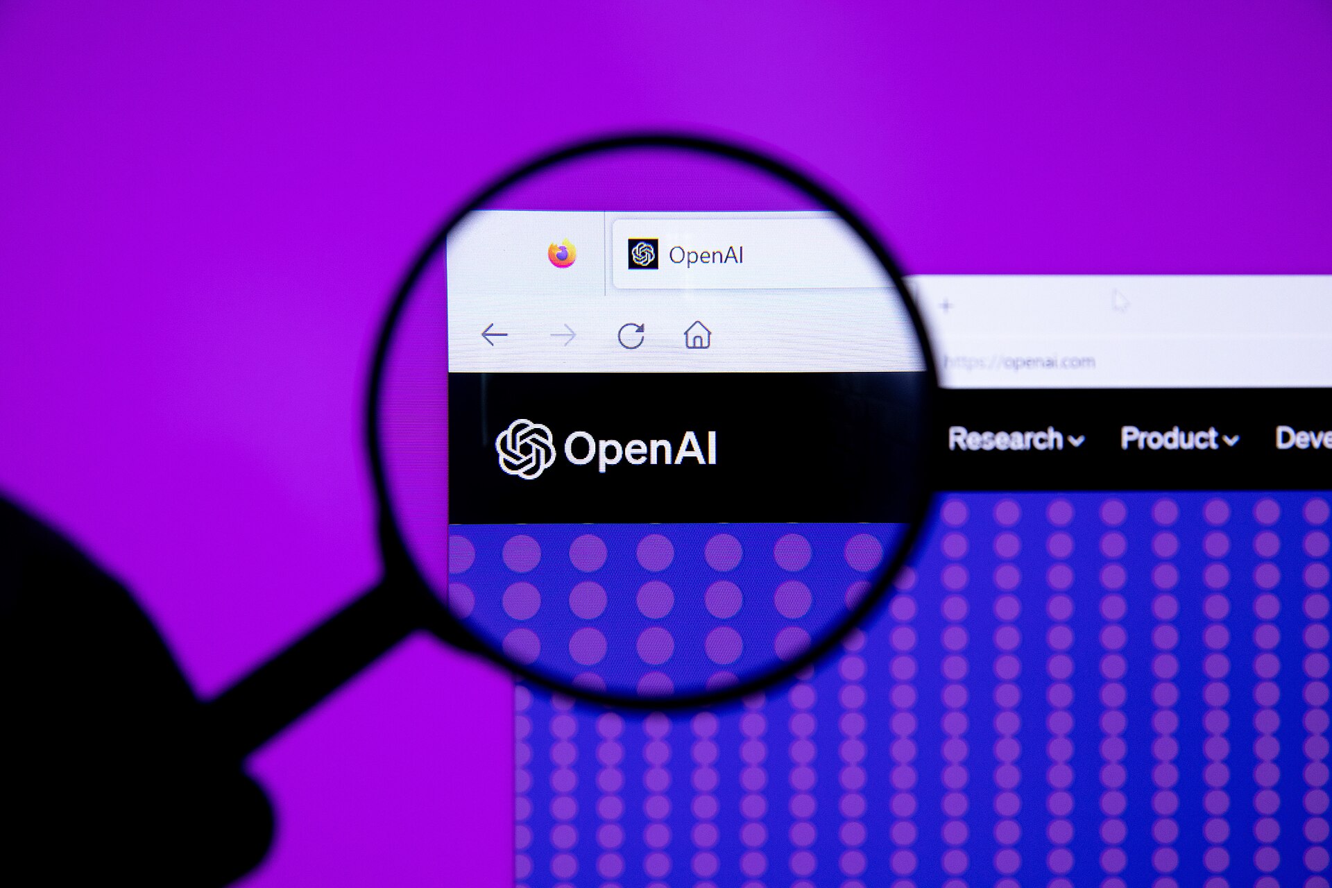 OpenAI logo with magnifying glass (52916339167).jpg