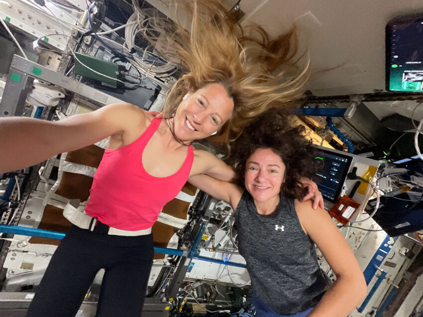 iss074e0315895 (Feb. 16, 2026) --- Expedition 74 Flight Engineers (from left) Sophie Adenot of ESA (European Space Agency) and Jessica Meir of NASA take a portrait together before beginning their exercise sessions. Afterward, Adenot worked out on the Advanced Resistive Exercise Device (ARED), which mimics free weights on Earth, while Meir jogged on the COLBERT treadmill. Both exercise devices are located inside the Tranquility module. Credit: ESA/Sophie Adenot