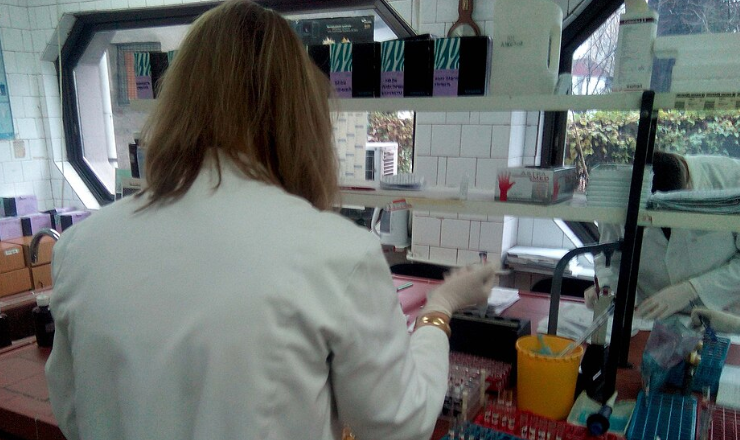 Biochemist working in biochemical laboratory