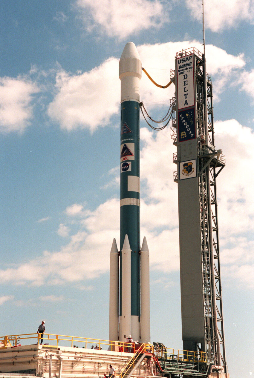 Delta II 7426 with Stardust before launch, Cape Canaveral, February 1999 original image caption: The Boeing Delta II rocket carrying the Stardust spacecraft waits for launch at Launch Pad 17-A, Cape Canaveral Air Station. The targeted launch time is 4:06 p.m. EST. Stardust is destined for a close encounter with the comet Wild 2 in January 2004. Using a silicon-based substance called aerogel, Stardust will capture comet particles flying off the nucleus of the comet. The spacecraft also will bring back samples of interstellar dust. These materials consist of ancient pre-solar interstellar grains and other remnants left over from the formation of the solar system. Scientists expect their analysis to provide important insights into the evolution of the sun and planets and possibly into the origin of life itself. The collected samples will return to Earth in a sample return capsule to be jettisoned as Stardust swings by Earth in January 2006.
