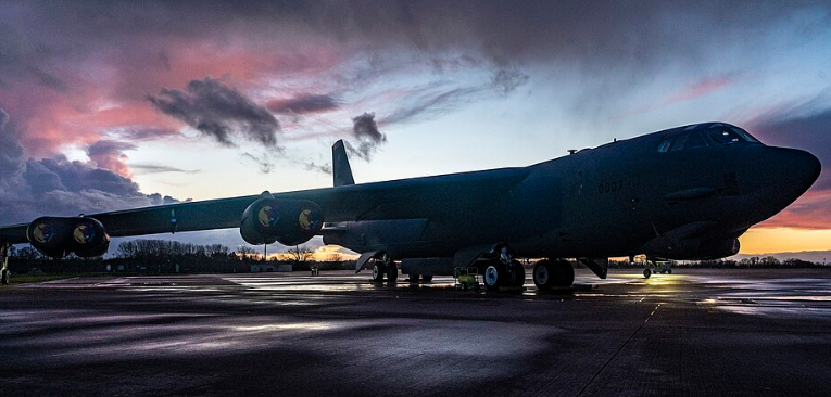 A U.S. Air Force B-52H Stratofortress aircraft is silhouetted against the evening sky at RAF Fairford, England, Feb. 26, 2025.