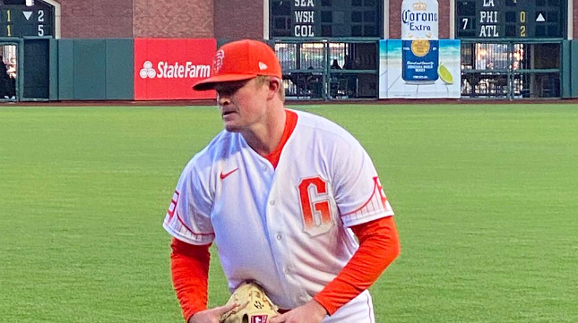 Logan Webb, pitcher for the San Francisco Giants and wearing the City Connect uniform, warming up before the game against the Arizona Diamondbacks. Taken September 28, 2021.
