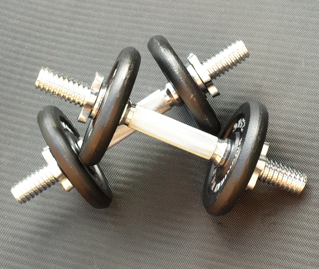 pair of dumbbells, dumbbells, weight plates, weight training, fitness