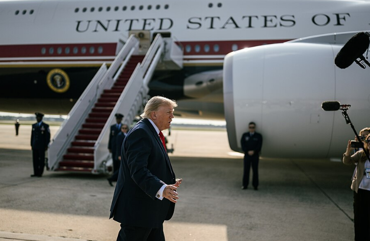 President Donald J. Trump speaks with members of the media before boarding Air Force One at Joint Base Andrews, Maryland