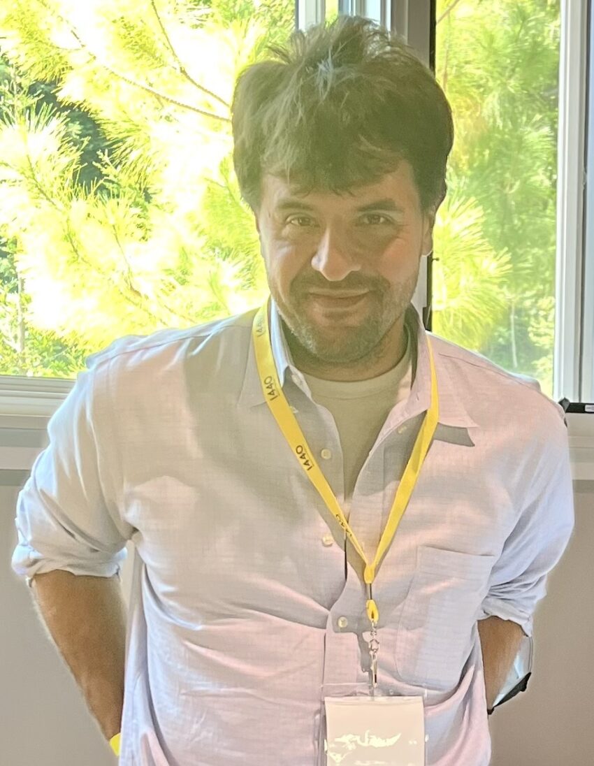 Or: How to change your mind, with psychedelics and optogenetics. Genevieve introduced the closing keynote for the PSFC Summit today: Karl Deisseroth is the pioneer of the mind-reading and writing tool (<a href="http://optogenetics.org" rel="noreferrer nofollow">optogenetics.org</a> at Stanford) that allows for individual neuron targeting and manipulation, and his new work looks at the effects of mind-altering drugs on brain function in detail. For a sense of the power of his methods: he can take a pair of mice than were just mating happily, and with a flip of a switch, they become violent to each other. He made a mouse walk in an infinite left turn loop when a fiber optic is flipped on in the motor cortex (with no apparent awareness or distress at being controlled this way). Another team selectively turned on subsets of parenting behavior (like bringing wandering young back to the nest or grooming behaviors). They can also probe three different sub-states of anxiety that we only experience as a bundle. How does this work? Before the plant kingdom evolved chlorophyll to harvest energy from sunlight, the more ancient bacteria used rhodopsins in a membrane-bound proton-pump to do the same. The rhodopsins captured a swath of the sun’s spectrum, tilting the algae to the leftover parts of the spectrum not yet absorbed, and this is why plants are green. Karl introduced these bacterial light-triggered elements into neurons of interest using a viral vector to the brain. He can then trigger neuronal firing optically, as the rhodopsin pump supplements the ion channels in the neuron. He can also trigger reporter molecules from the bacterial world to read out brain activity as the brain is functioning. So, for example, he has observed a 3 Hz cycling in the retrosplenial cortex of a mouse brain on ketamine, and he has been able to reproduce the effects with optogenetic stimulation to achieve similar effects. He has also found that the dissociative drugs (ketamine and PCP) allow for reflexes to pain (e.g., heat on paw or puff of air to eyes) to continue normally, while the protective cognitive reactions (licking the paws after heat or squinting in anticipation of the next puff) disappear, a disassociation of mind and body reflexes. He is diving deeper into the brain to investigate how this works, finding that the various subregions of the thalamus are regulated by disassociative drugs by overpowering the voting circuits with a pulsing 3 Hz modulation of the ketamine-enhanced circuits. The other nodes in the thalamus are operating as before, but do not achieve as powerful a consensus. The thalamus regulates where we spend our attention and conscious focus, to avoid doing everything we might be tempted to do simultaneously, and thereby not really doing any of them well. In his latest work, he has found that MDMA operates very differently than Ketamine (work to be published later this year). The implications of this level of understanding are enormous. The questions we can now ask using optogenetics will transform how we understand mental disorders and also call into question some deep philosophical questions surrounding consciousness and free will. It may also unveil the mysteries about how psychedelics operate in the brain, allowing us to optimize the use cases for testing in human clinical trials. Exciting work is going on with psilocybin for alcohol use disorder, extreme OCD and the eating disorders (which are also a disassociation of mind from body).