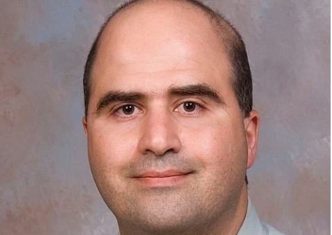 Nidal Hasan photographed in 2007 at the Uniformed Services University of the Health Sciences. Hasan was a United States Army captain at the time of the photo.