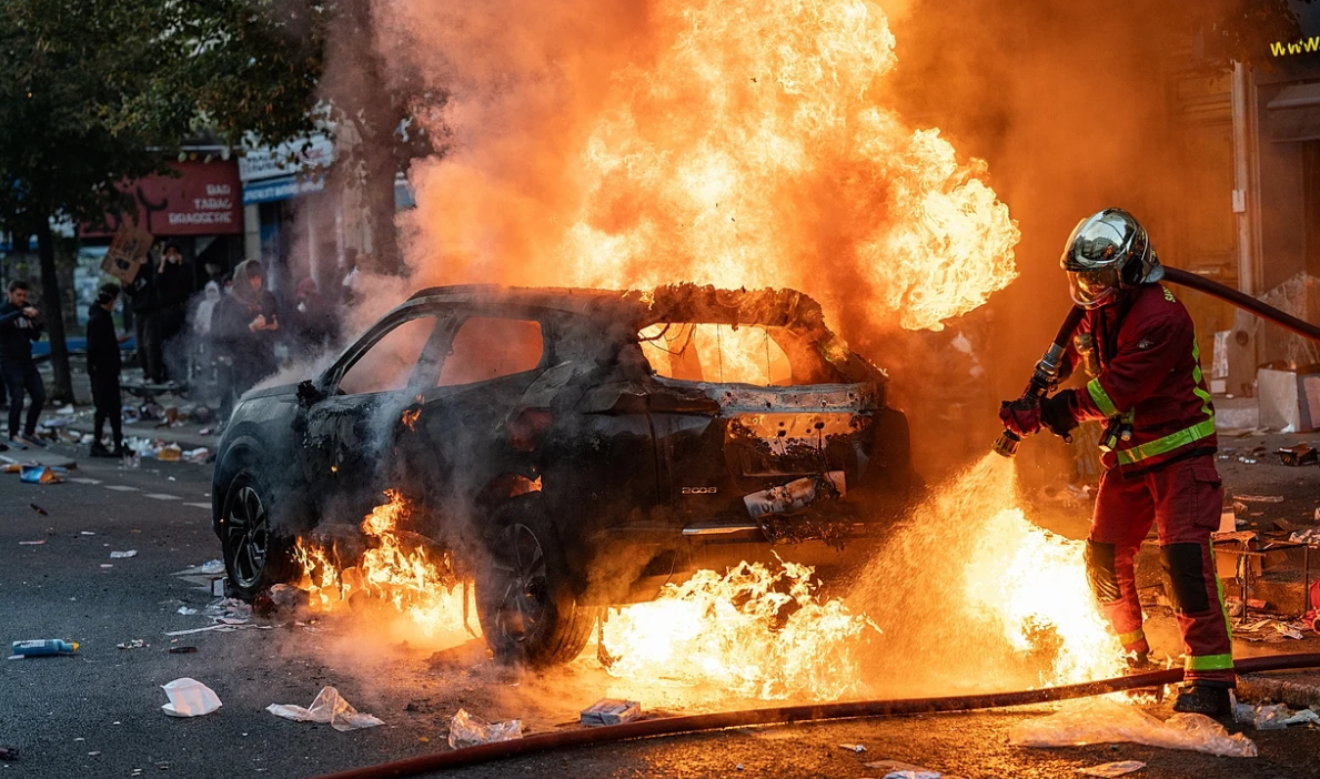 Protests and riots in Paris on 17 October 2026. Demonstrators gathered around Place de la République amid tear gas;